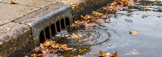 Water pooling near a storm drain
